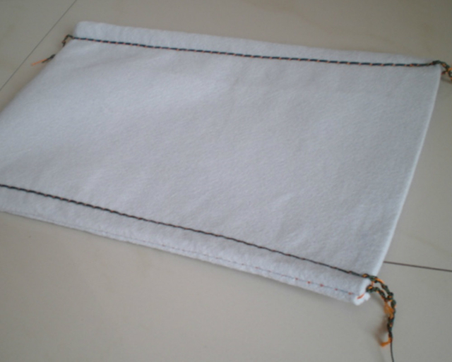 O lodo não tecido do geotêxtil do perfurador da agulha ensaca Geobags para o projeto civil